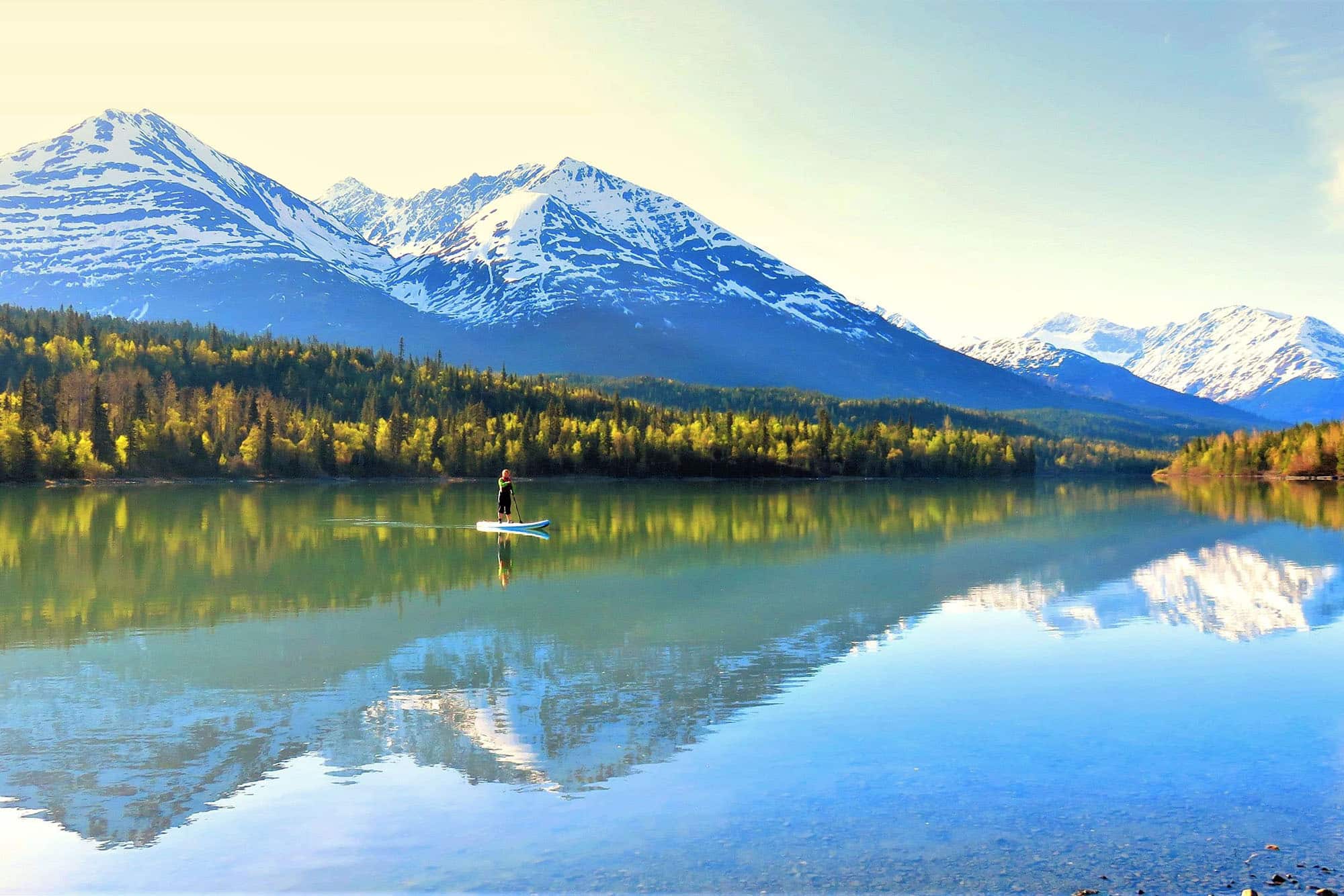 Early Morning Paddle Boarding in Moose Pass, AK by Yvonne Lleutwyler
