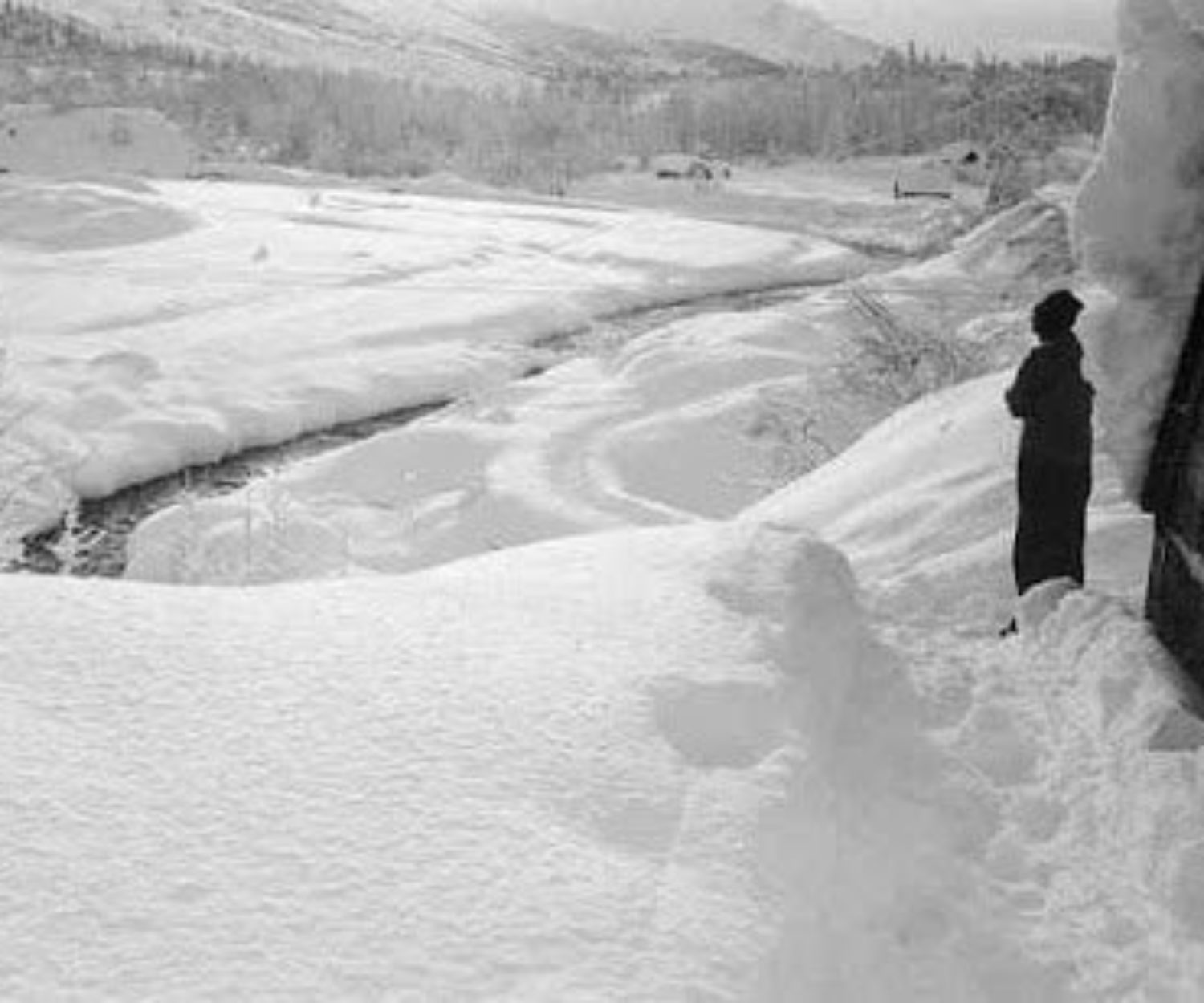 Looking south from the door of Manitoba Cabin with Lauritsen Cabin on the near right on the Eastern Kenai Peninsula in ALaska