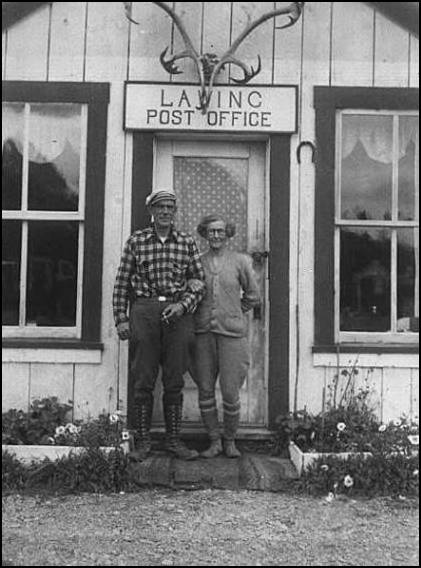Nellie and Bill Lawing in front of the Lawing Post Office