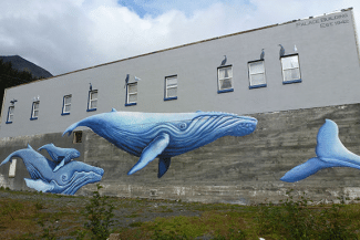 The original mural that came down in 2018: “Sea-ward Bound,” of humpback whales by Justine Pechuzal and Liza McElroy