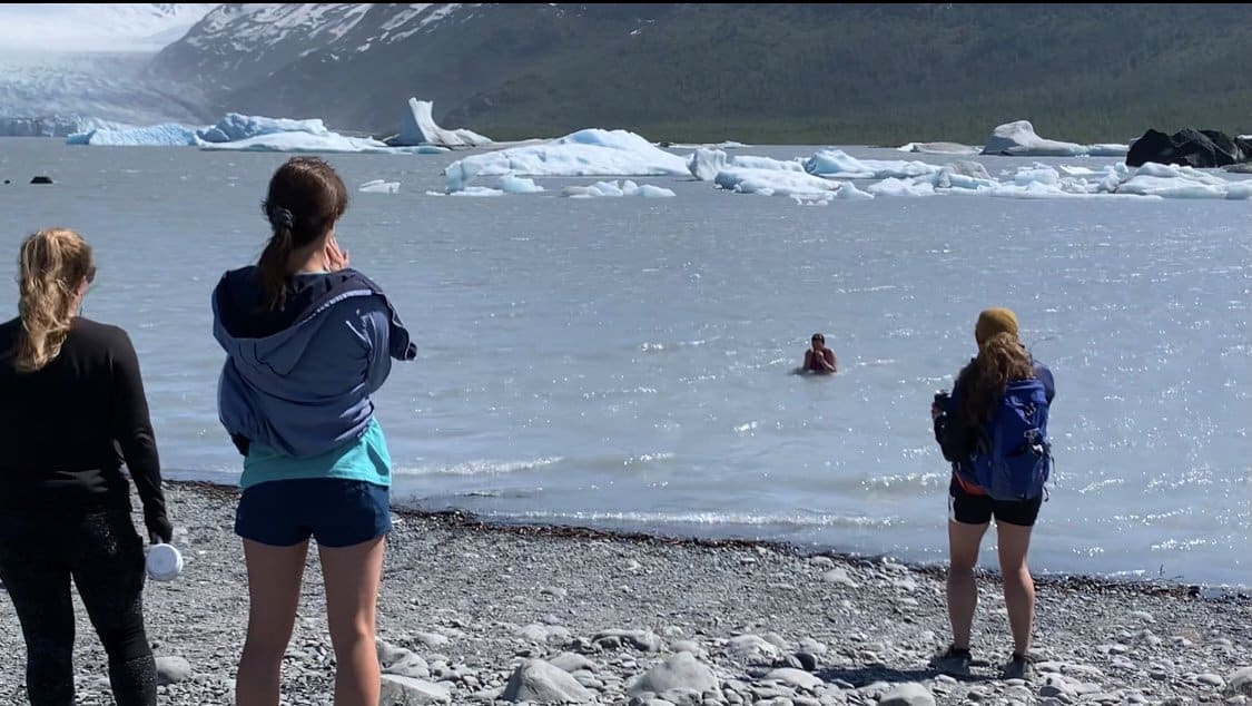 Racers took some post race dips in Spencer Lake after completing the Spencer Glacier 5M Dash